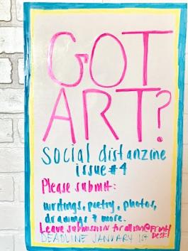 hand-written poster in pink and green marker with the text "got art?" and requesting submissions to social distanzine