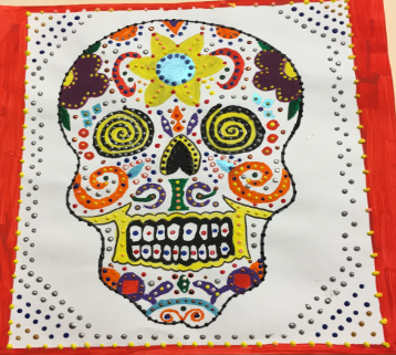 Colorful skull on white paper made from puff paint dots