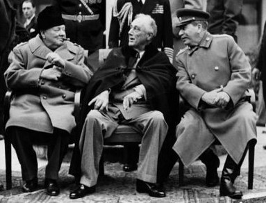 Churchill, FDR and Stalin seated at the Yalta Conference. Source: https://www.nvlchawaii.org/d-day-martial-law-ends-hawaii-yalta-conference