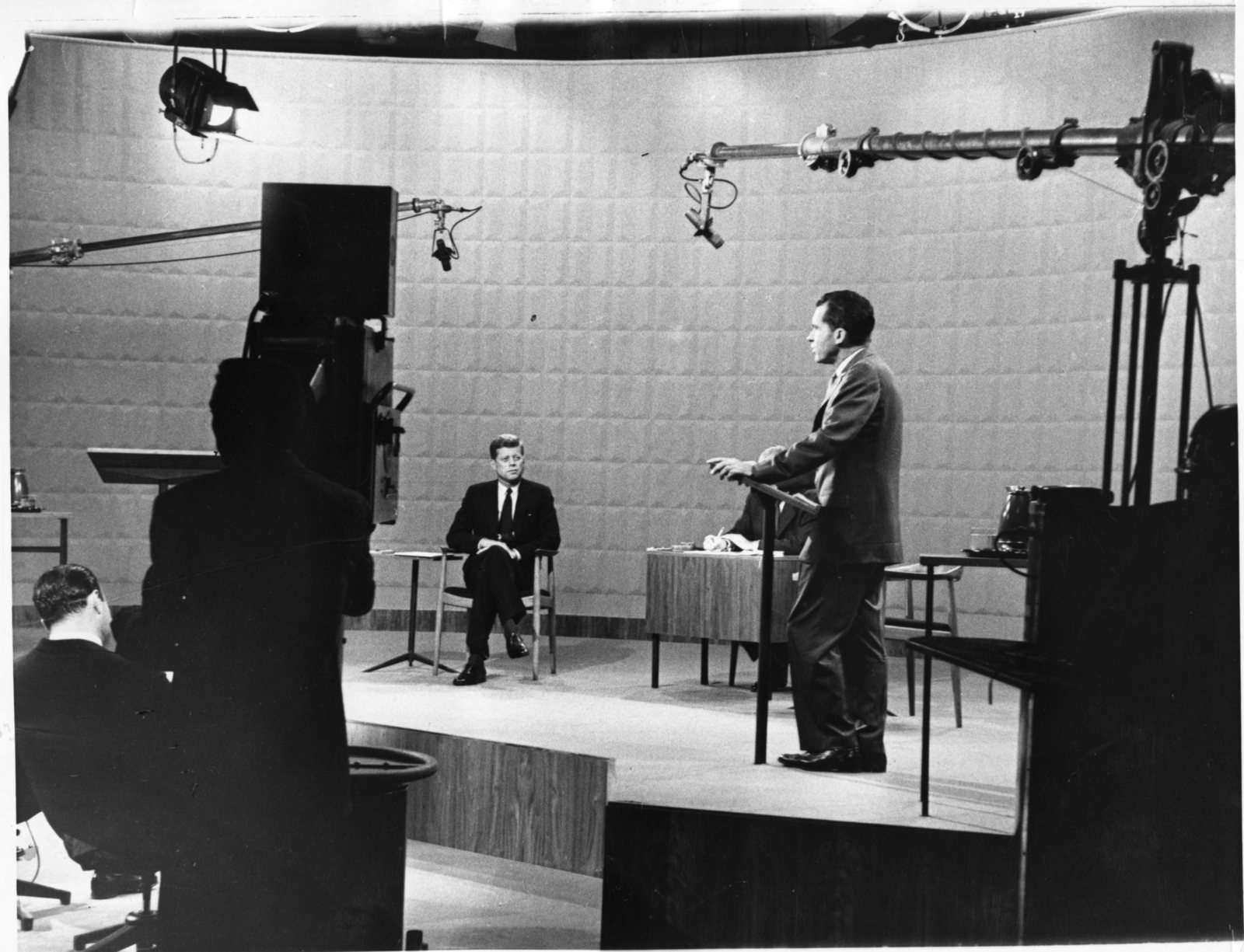 Richard Nixon and John F. Kennedy debate in Chicago while being televised, 9/26/1960