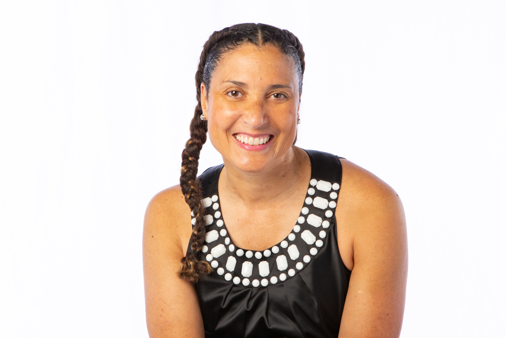 Headshot of Author Tricia Downing