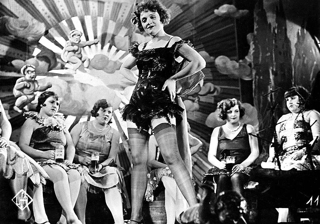 Promotional photo of Marlene Dietrich with chorines in the film The Blue Angel - http://commons.wikimedia.org/ 
