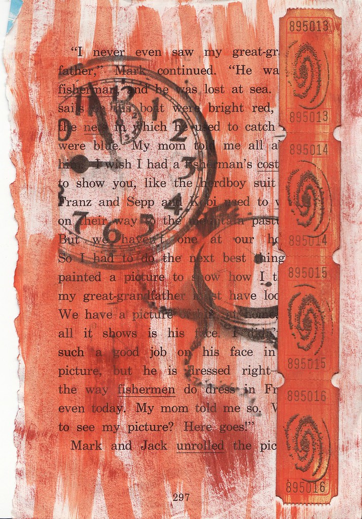 Photo of a book page that has been decorated with red paint and stamps