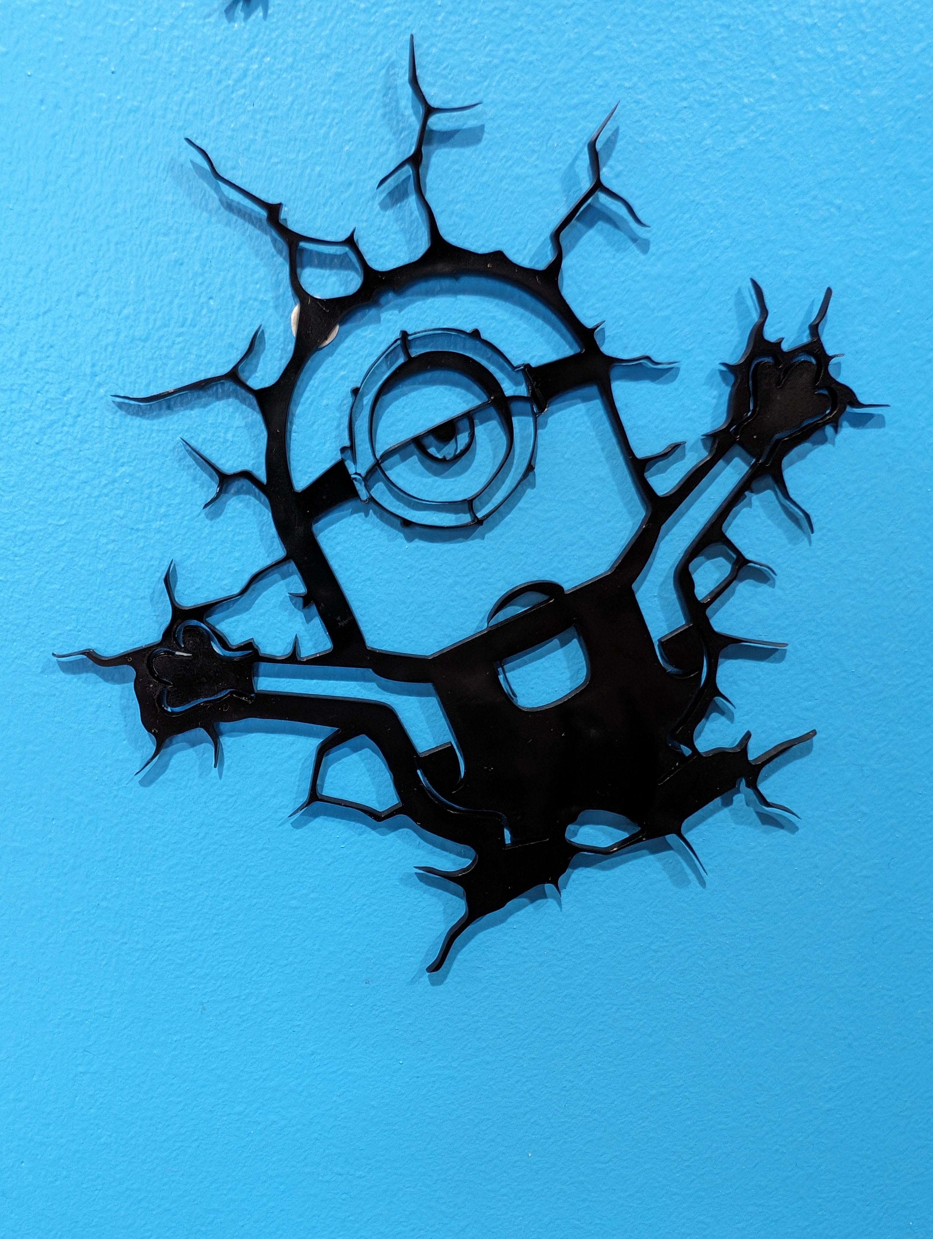 black acrylic minion wall decoration