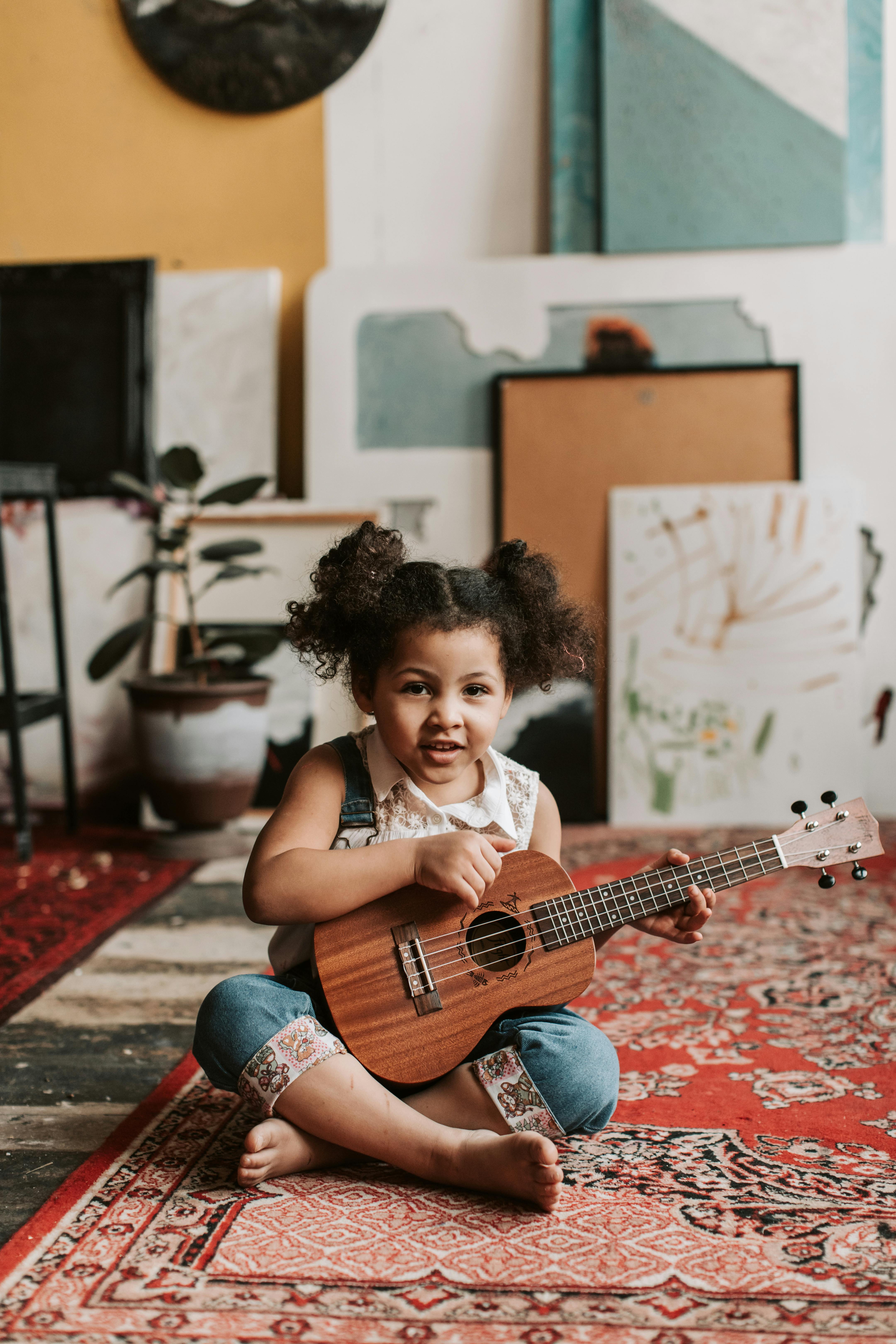 child with guitar