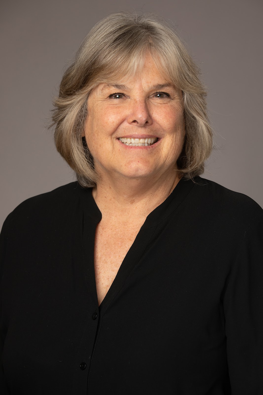 Portrait photograph of Library Commission Secretary Laurie Mathews