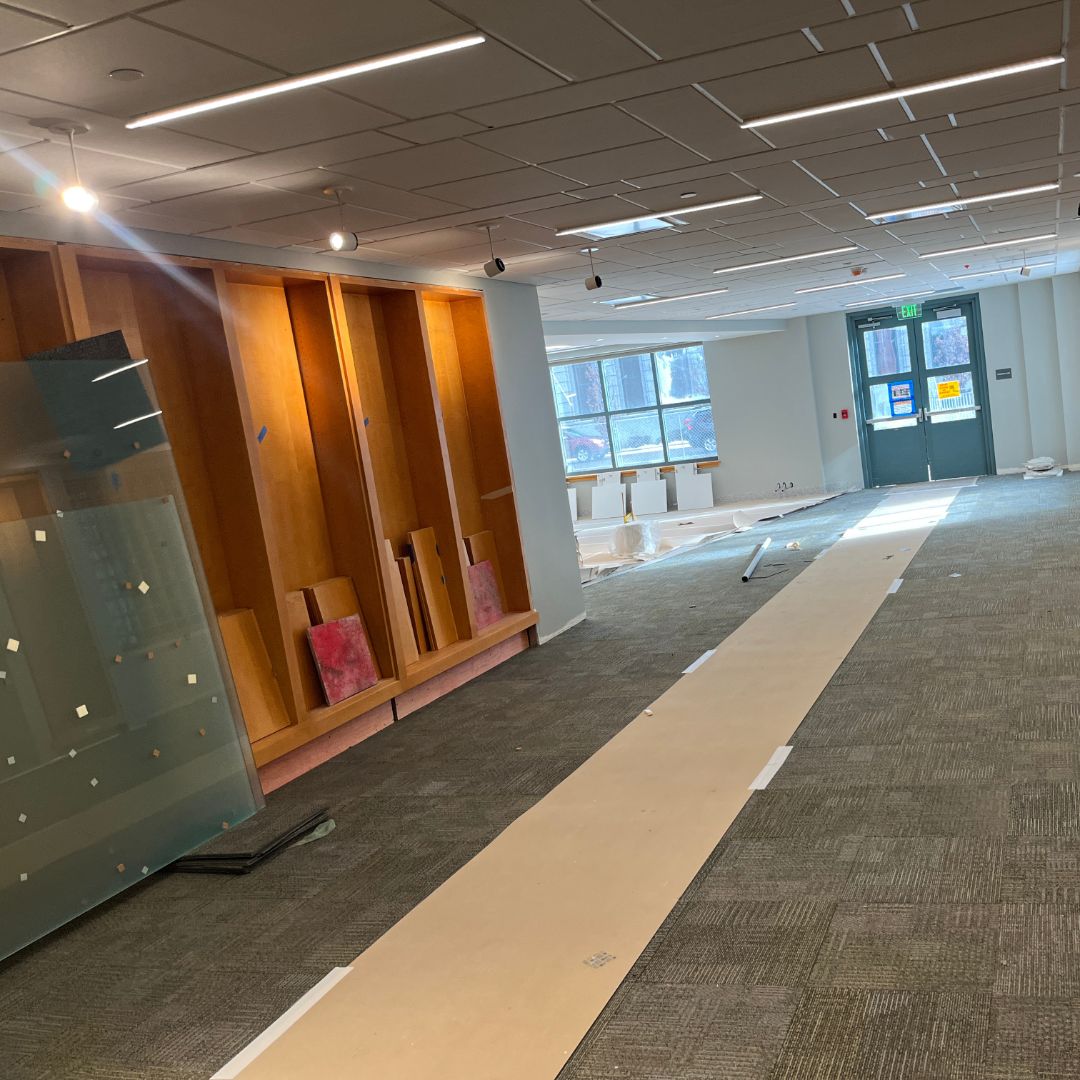 Image of current progress on a future book shop and cafe area in the Central Library. Carpet and ceilings are installed and glass is waiting to be installed.