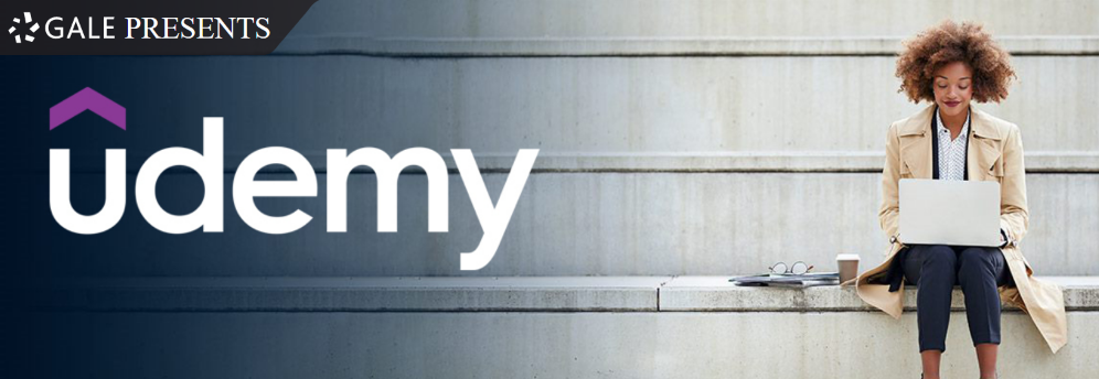 Udemy logo with woman using a laptop computer