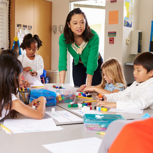 Teaacher in classroom with children