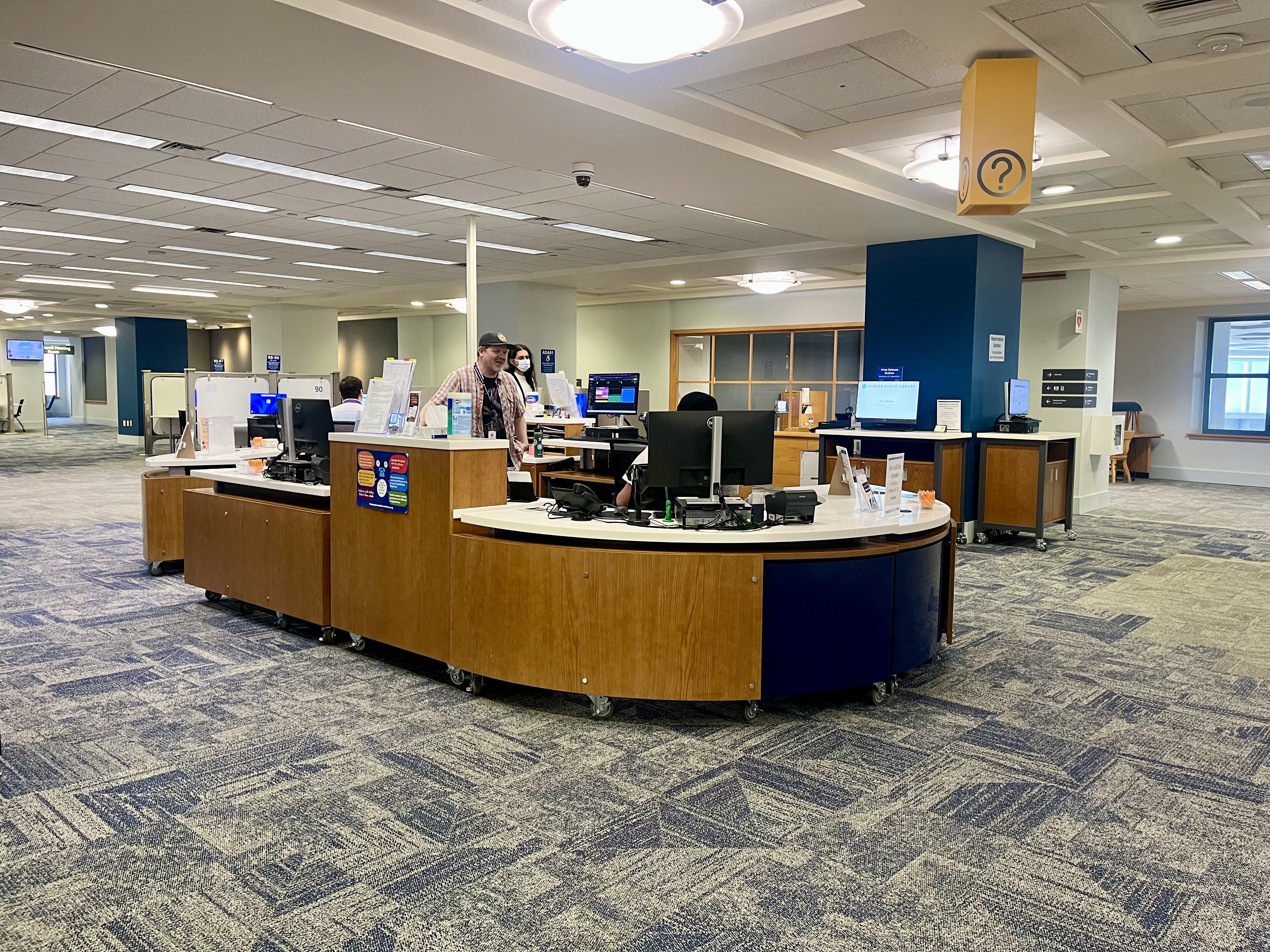 View of Central's 4th floor Computer & Technology Center. Information desk and computer pods