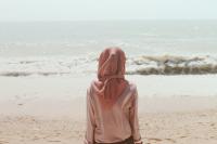 Woman looking out to sea.