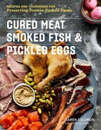 Book cover of Cured Meat, Smoked Fish, & Pickled Eggs that features photo of different meats and eggs on platters