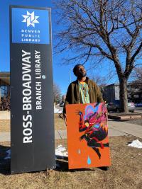 Aaron Sutton outside the Broadway Branch Library