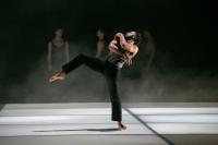 Black male dancer performing Rush Hour 2 by Larry Keigwin