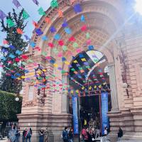 Photograph of arch and banners