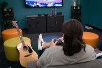 A photo of the back of teen's head at the Hadley Branch Library teen space.