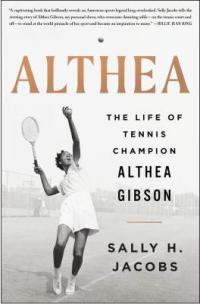 Althea Gibson arching back to hit a serve