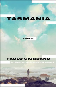 cover Tasmania depicting sole figure standing on a beach