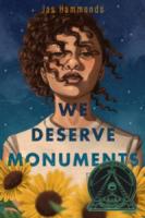 We Deserve Monuments book cover showing a young person facing forward with hair blowing across their face and sunflowers