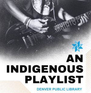 A person's hands and arms playing an electric guitar