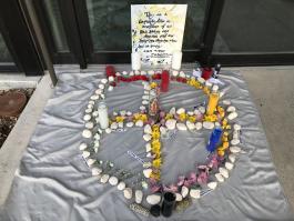 Photo of community altar outside the Rodolfo "Corky" Gonzales branch, June 19, 2020.