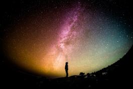 Image: Human Looking Up At the Milky Way and Stars 