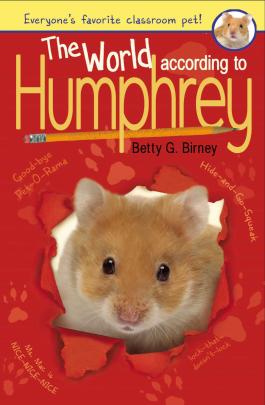 Red book cover of The World According to Humphrey with a furry hamster face peeking through the center