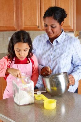 Woman and child cooking together