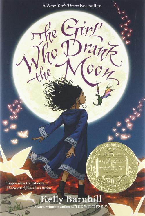 Book cover of The Girl Who Drank the Moon with a girl with brown skin and black hair looking up at a full moon