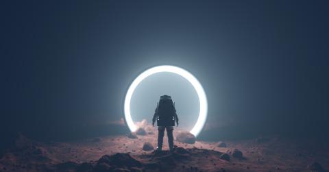 image of astronaut infront of moon