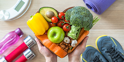 Heart shaped bowl with veggies and fruits